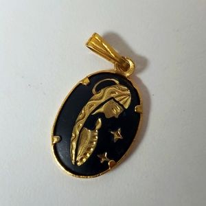 Pretty black and gold Mother Mary pendant